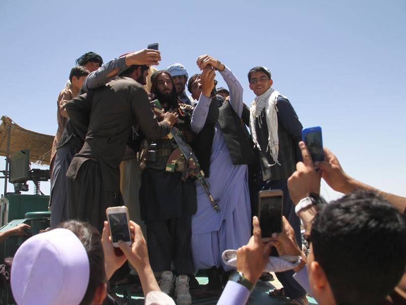 The Taliban have urged people to take selfies with them during an Eid ceasefire in Afghanistan. The Taliban have urged people to take selfies with them during an Eid ceasefire in Afghanistan.